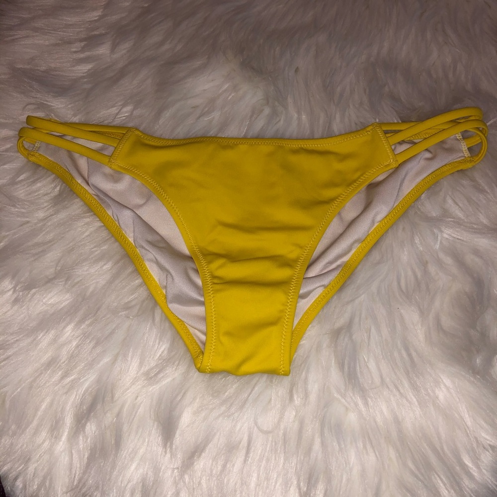 Yellow Victoria’s Secret bikini bottom